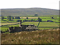 Mount Haley and farmland in the valley of Burnhope Burn