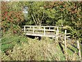 SK5626 : Footbridge by the ford on Sheep Plank Lane by Ian Calderwood