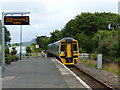 Class 158 train approaching Criccieth Station