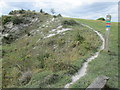 TL0529 : Chalky path round the edge of the disused pit by Peter S