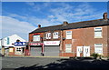 Shops and houses on Oldham Road (A669)