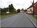 TL8628 : Entering White Colne on the A1124 Colneford Hill by Geographer