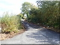 The entrance to a farm access road on the east side of Coolderry Road