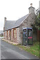 Boarded-up cottage, Embo