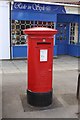 NZ3862 : Postbox, Front Street, Cleadon by Graham Robson