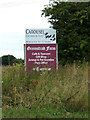 TL8329 : Greenstead Farm sign by Geographer