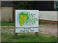 TL8523 : Peter Watts Wines sign by Geographer