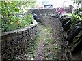 Walled footpath at Normans Farm