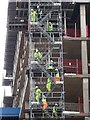 SP0686 : Workmen descending stairs by Philip Halling