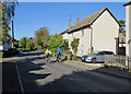 Harston: cyclists in Church Street