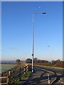 SJ3664 : A frosty morning alongside the A5104 and the moon by John S Turner