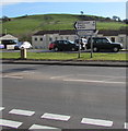 Direction and distances signs alongside the A4061 in Pant-yr-awel