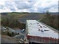 Looking along new bridge over Middle Dolfor Road