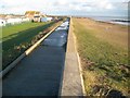 TM1212 : Seawick: Sea defence wall at St Osyth Beach by Nigel Cox