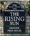 Sign for the Rising Sun public house