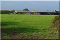 Buildings across field at Brixey