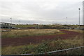 SP7360 : Unkempt athletics track next to the football stadium by Philip Jeffrey
