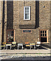 Tables and chairs outside Columbus House, Cinnamon Street, Wapping