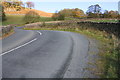 Bends in Barden Road under Eastby Crag