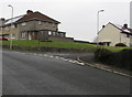 Rooftop solar panels near a suburban corner, Bridgend