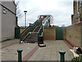 Steps up to bridge over Central Line and A12