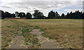 SP2860 : Grounds of Watchbury Hill across a field by Robin Stott