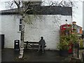 Sculpture on a seat, Gunnislake