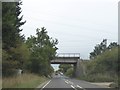 Railway bridge over A128 at Barnards