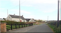 J2634 : Bungalows at the Close Road junction on the Islandmoyle Road by Eric Jones