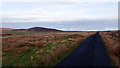 ND1331 : Road across the moor by John Lucas