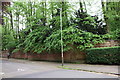 Brick wall beside Westcotes Drive