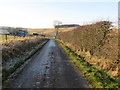 Minor road approaching the A6088 road at Peel Knowe