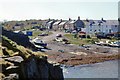 NU2519 : Craster from the harbour wall by Peter Jeffery