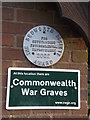 Plaques on the lychgate at St Giles Church