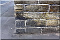 Benchmark on wall at High Street / Bradford Road junction