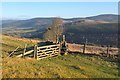 NT3032 : Gate and stile, Fethan Hill by Jim Barton