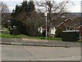 Dark green cabinets on a suburban corner of Caerleon