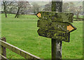 A very old footpath direction sign