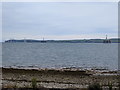 Beach and oil rigs in the distance