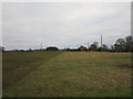 Stubble field and bungalow by the B1222