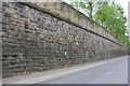 Stone embankment wall on south side of Holmes Road