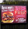 Buy one get one free burgers advert on an Almond Drive fence, Malpas, Newport