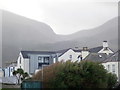 Heavy rain shower descending down the Glen Valley above Newcastle