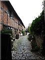 Cobbled path to the Tudor World Museum, Sheep Street