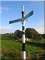 Direction sign - Signpost on the A702 east of Kirkland