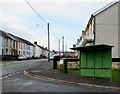 Green bus shelter and green telecoms cabinet on a Cwmdare corner