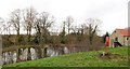 SE7766 : Mill dam at Manor Farm by Gordon Hatton