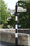 TF1509 : Old Direction Sign - Signpost by the B1166, Bridge Street, Deeping St James by Milestone Society