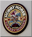 Hobbyhorse sign on the wall of the Winchester Bar, Merthyr Tydfil