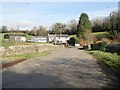 Farmhouse and outbuildings at the eastern end of Gambles Bridge